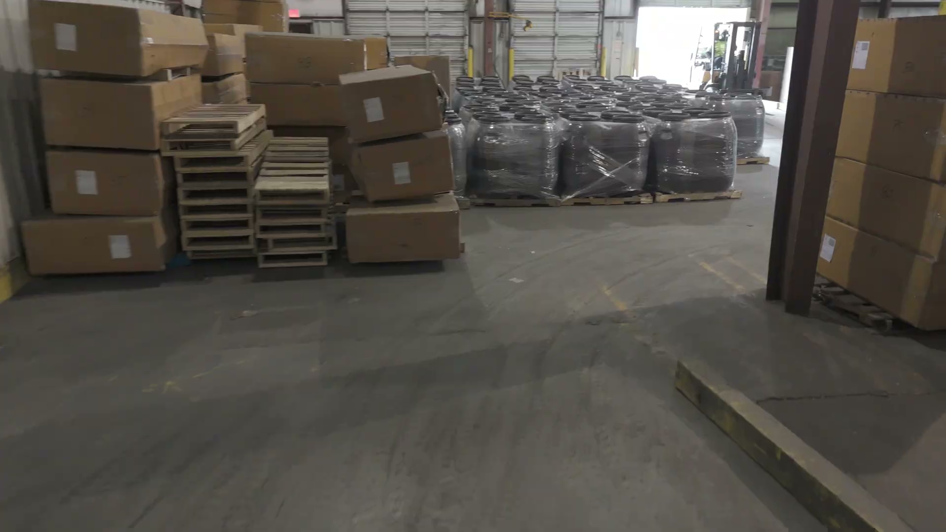 Palletized cartons and super sacks staged near the dock at Carroll's Norfolk warehouse