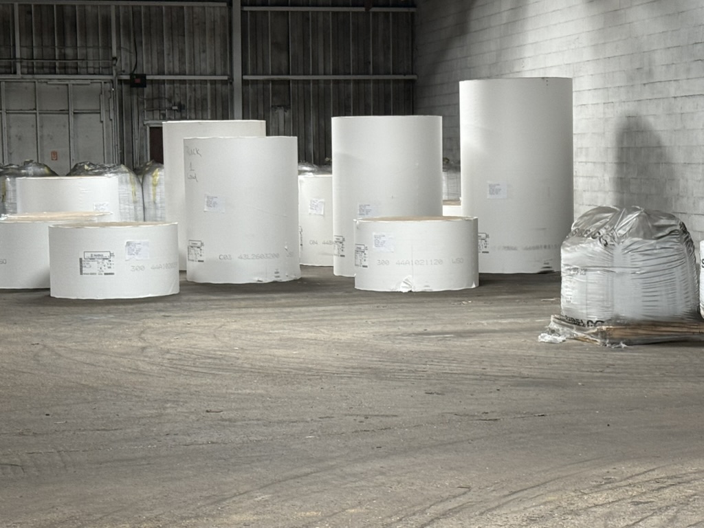 Paper rolls staged inside Carroll's Norfolk warehouse